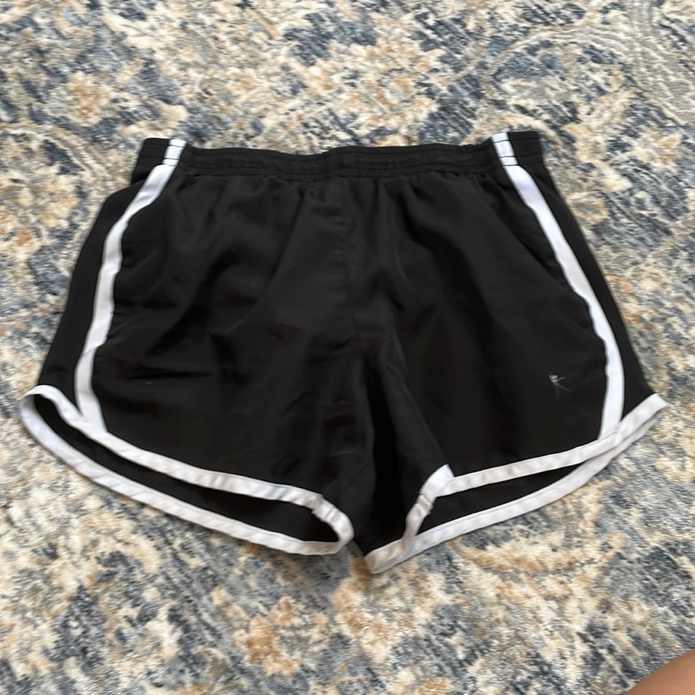 Black and white athletic style shorts. Size medium (petite)